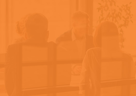 People behind orangebackground