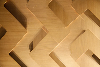 White wooden blocks behind blue background